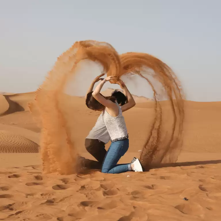 Dubai Desert Safari, Sandboarding & Camel Ride with BBQ Dinner