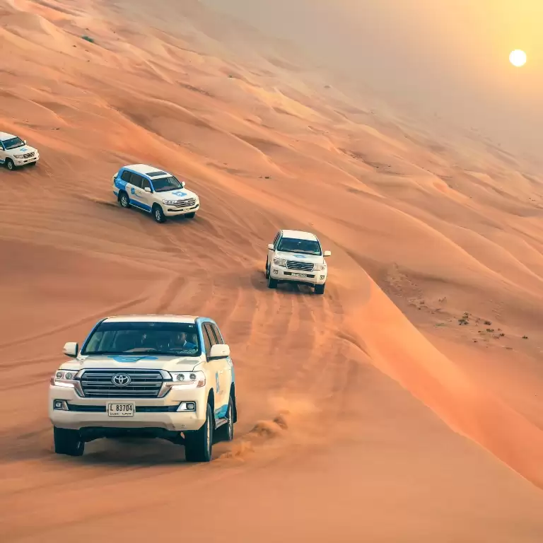 Overnight Red Dune Desert Safari with Dune Bashing, BBQ Dinner & Breakfast