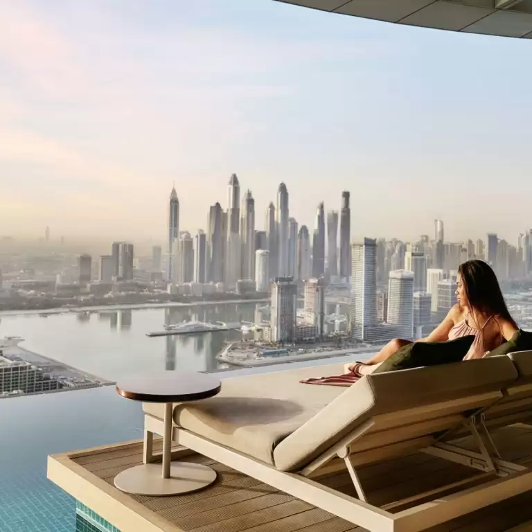Aura sunrise pool experience with Burj view