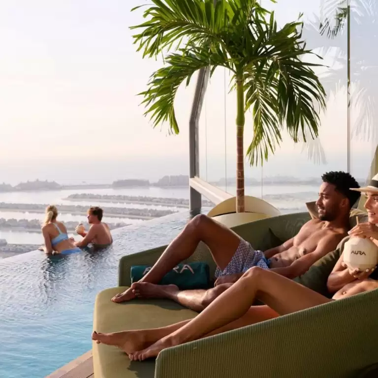 Aura sunrise pool experience with Burj view