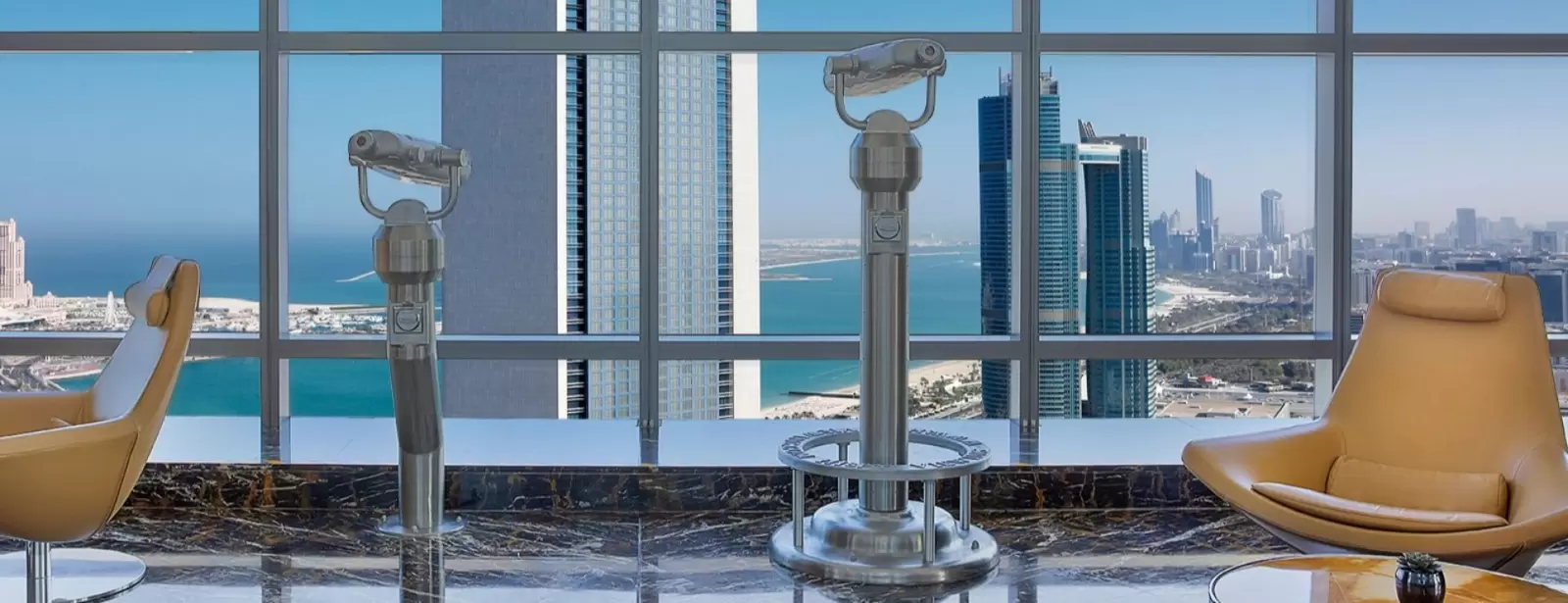 Etihad Tower Observation Deck with coffee or tea and slice of cake