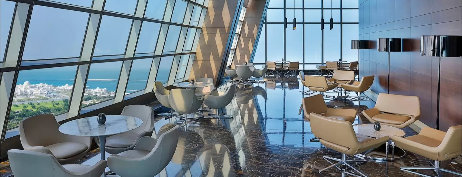 Etihad Tower Observation Deck with coffee or tea and slice of cake