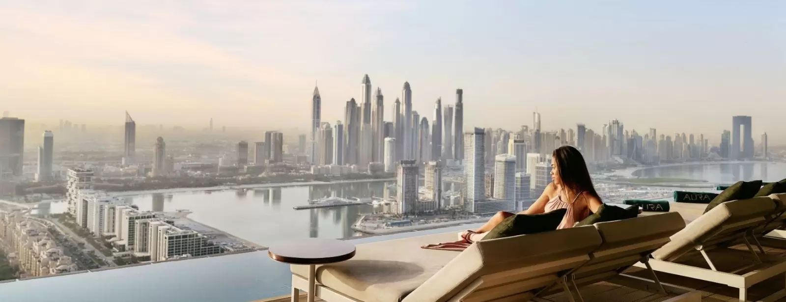 Aura sunrise pool experience with Burj view