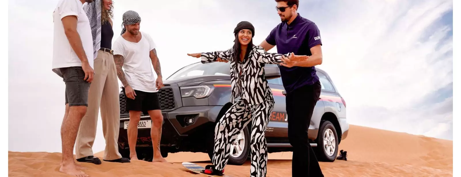 Dubai Desert Discovery: Red Dunes Safari, Sandboard & Camel Ride